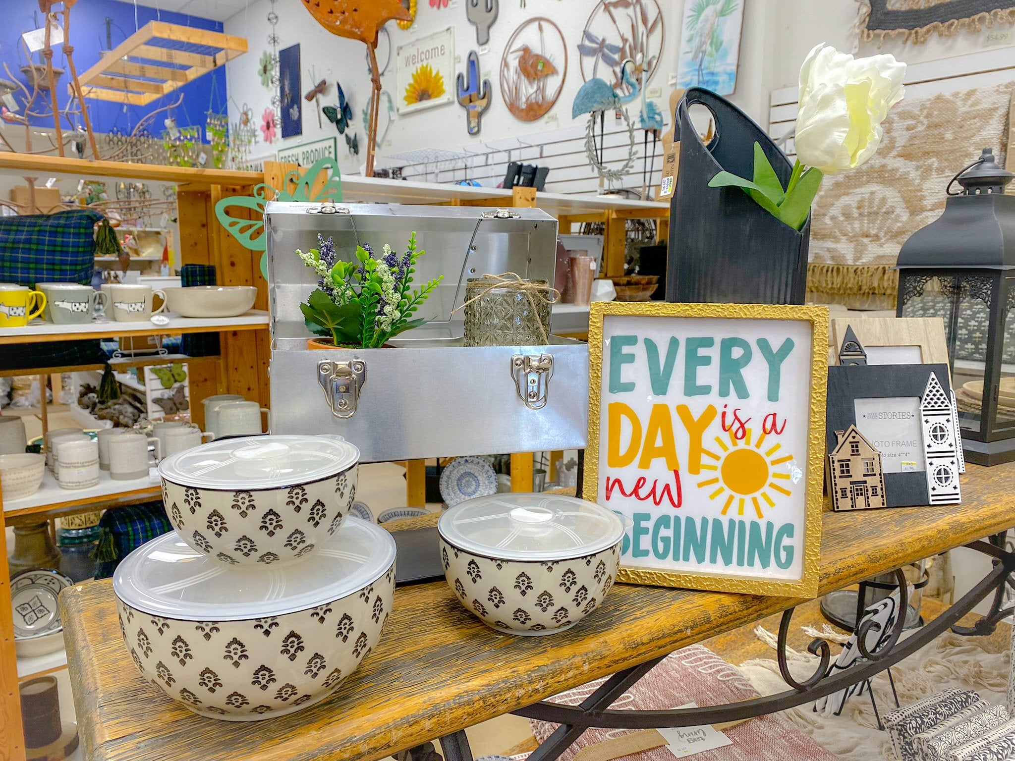 L. May lunchbox with home decor and gardening products from backyard birder in sudbury