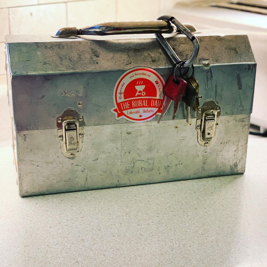 vintage L. May lunchbox with keychains from the rural dad