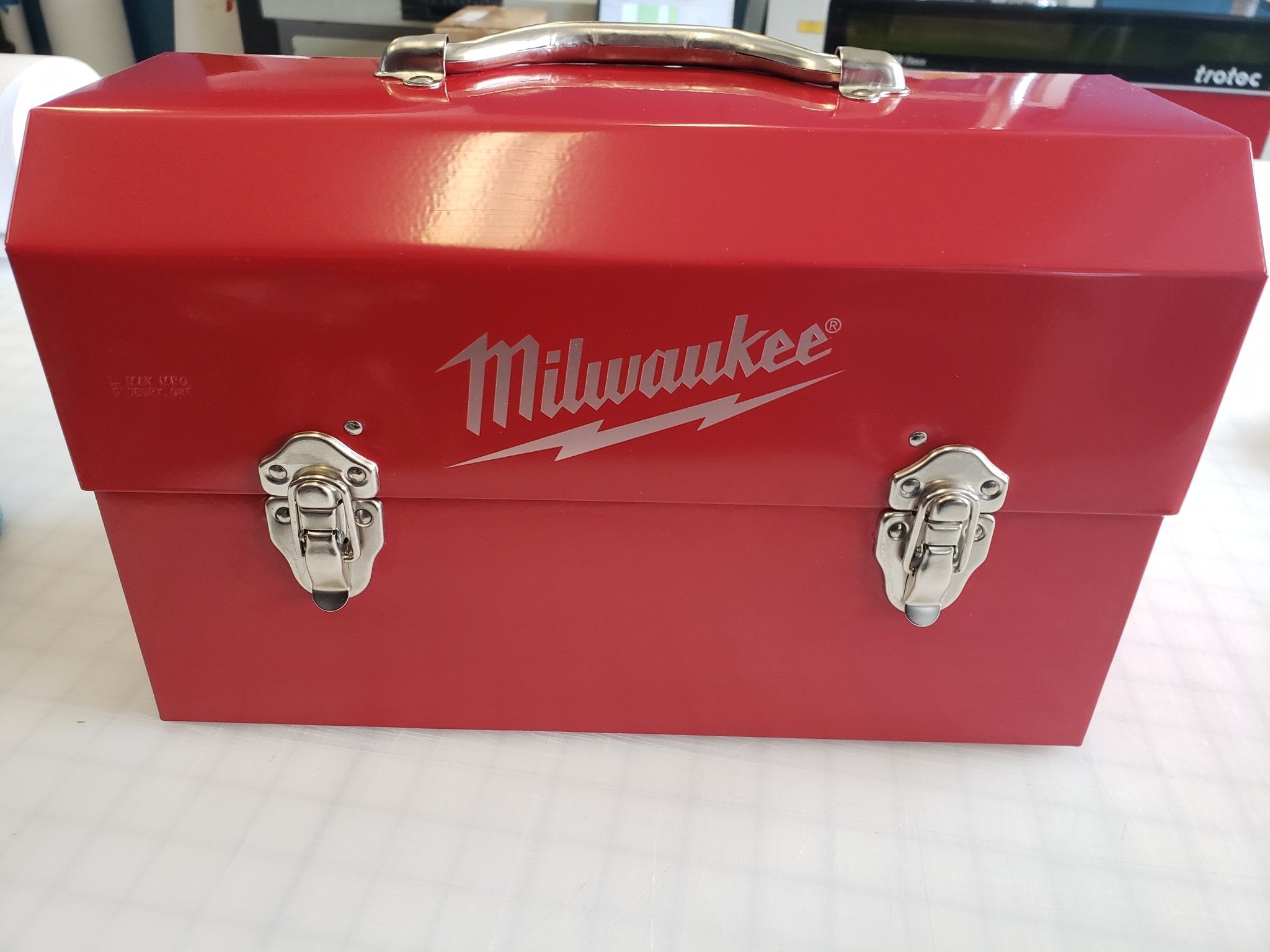 personalized L. May lunchbox with miwlaukee logo and powder coated in milwaukee red 