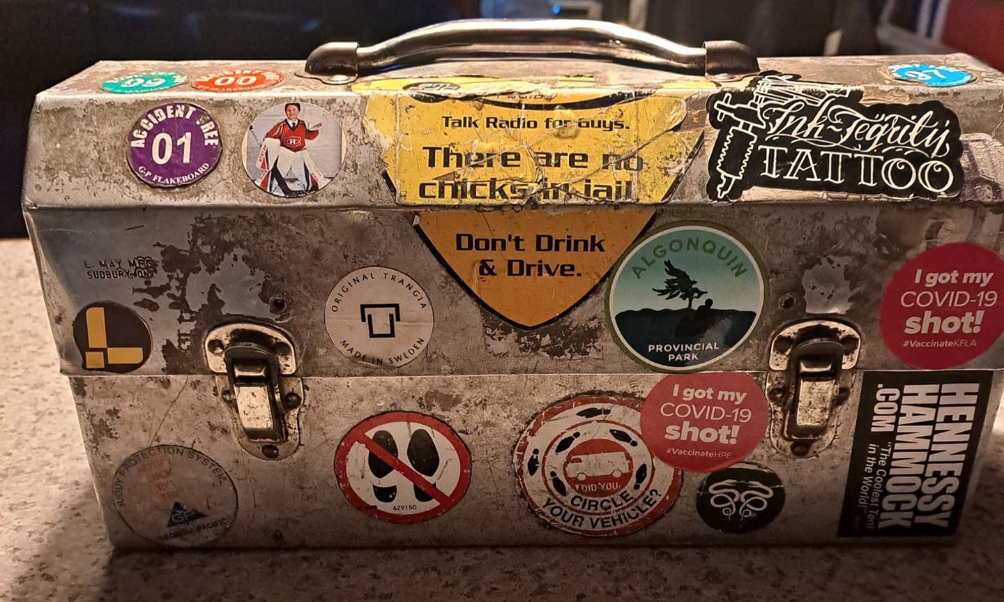 vintage L. May lunchbox with stickers